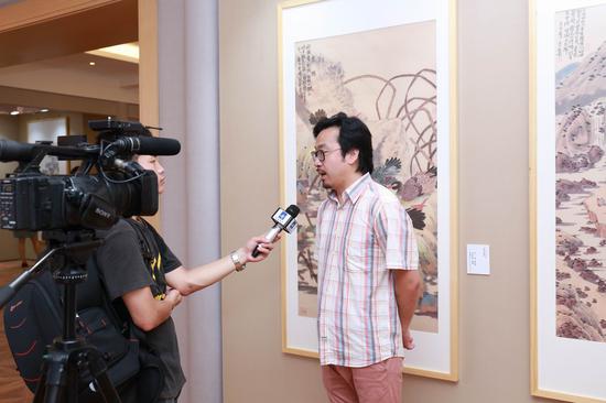 展览总策划、共和社文化艺术机构执行董事王凯接受采访